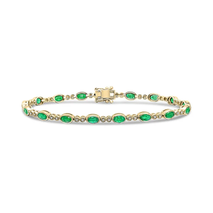 Gold Bangle Bracelets for Women-18ct Gold yellow and white gold oval emerald and brilliant cut diamond bracelet