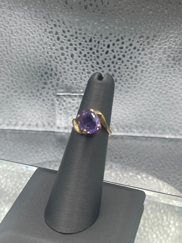 Gold Plated Rings-Ladies 10 Karat Solid Yellow Gold Amethyst Bypass Ring