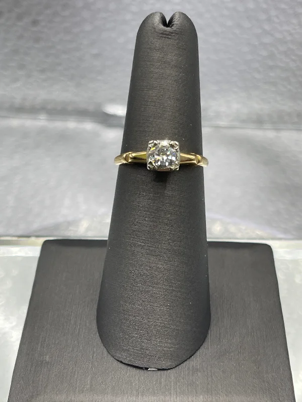 Custom Rings-A ladies Vintage 14 Karat Yellow Gold Diamond Engagement Ring