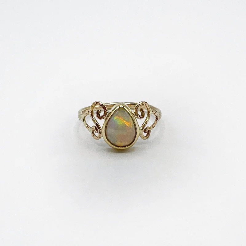 Simple Wedding Bands-Pear Opal Golden Swirls Ring